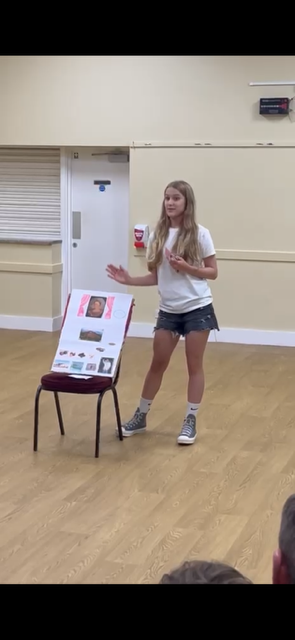 Student presenting in a Pure Performance class