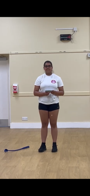Student presenting in a Pure Performance class