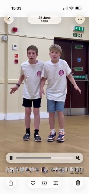 Two students performing together in a Pure Performance class